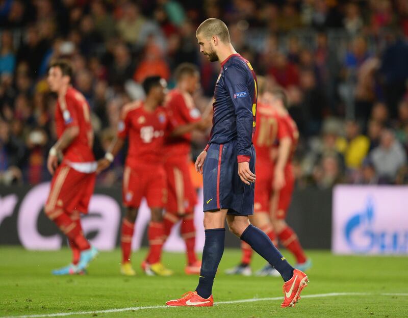 BARCELONA, SPAIN - MAY 01:  Gerard Pique of Barcelona shows his disappointment after scoring an own goal during the UEFA Champions League semi-final second leg match between Barcelona and FC Bayern Muenchen at Nou Camp on May 1, 2013 in Barcelona, Spain.  (Photo by Mike Hewitt/Getty Images) *** Local Caption ***  167857310.jpg