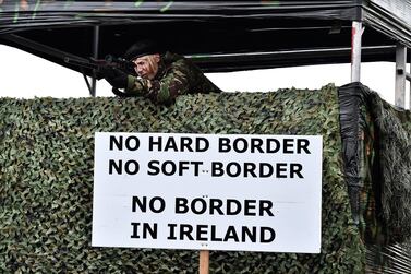 Members of the Border Communities Against Brexit take part in a mock customs border check between Ireland and the UK. Getty