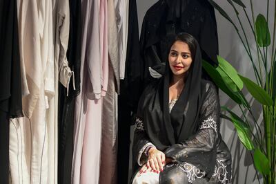 Emirati entrepreneur Mariam Al Marar at her abaya pop-up shop. Khushnum Bhandari / The National
