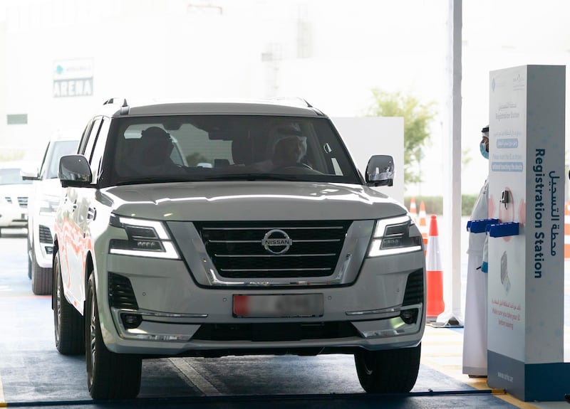 The Crown Prince of Abu Dhabi arrives at a drive-through testing lab at Zayed Sports City on Saturday. All photos courtesy of Ministry of Presidential Affairs