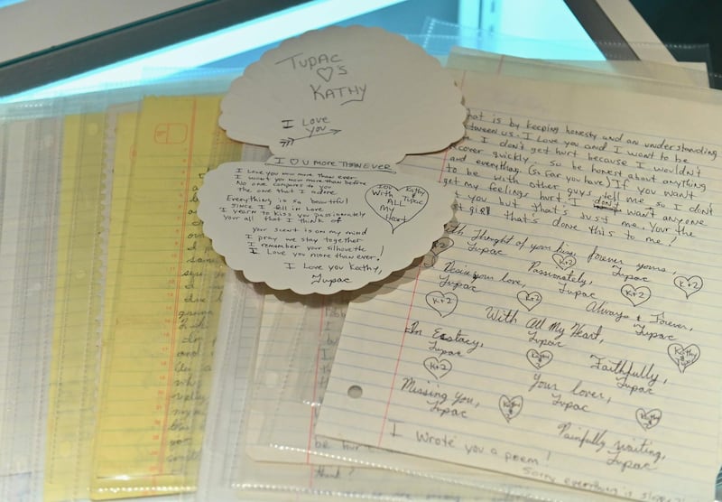 An archive of 22 love letters from Tupac Shakur to a high school sweetheart is displayed. AFP
