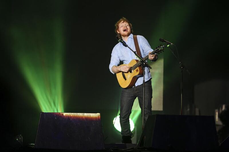 English singer-songerwriter Ed Sheeran performs to fans at Dubai Media City Amphitheatre in Dubai, March 5, 2015. Sarah Dea / The National