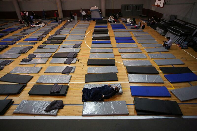 Ukrainians who fled to Mexico amid Russia's invasion of their homeland arrive at a shelter near the US border, in Tijuana, Mexico. Reuters