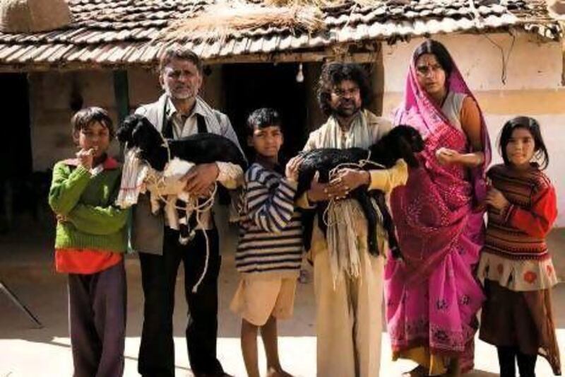 Omkar Das Manikpuri, Raghubir Yadav, Naseeruddin Shah, Nawazuddin Siddiqui, Shalini Vatsa and Malaika Shenoy in the film Peepli Live. Courtesy Peepli Live Official Website