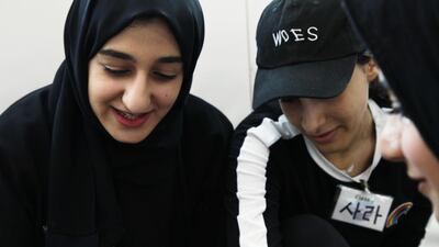 Shaima Al Ahammadi (left) at Abu Dhabi's K-Pop academy