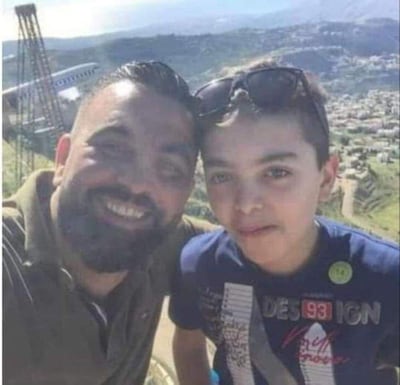 Amine Zahid, 42, and his son pictured. The father of two went missing in Tuesday's blast in Beirut but has been recovered from the sea. Facebook