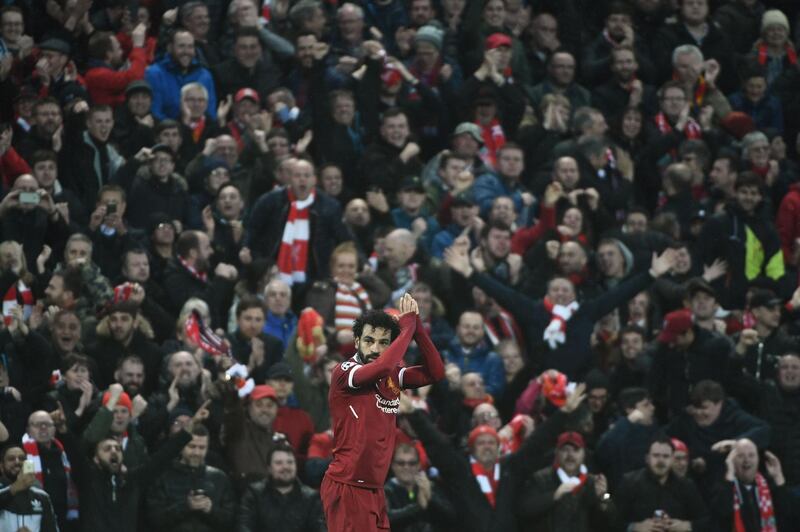 Liverpool's Mohamed Salah celebrates after scoring. Filippo Monteforte / AFP
