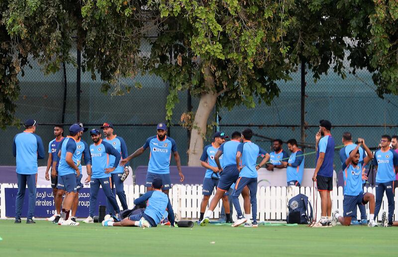 India players take a break during training.