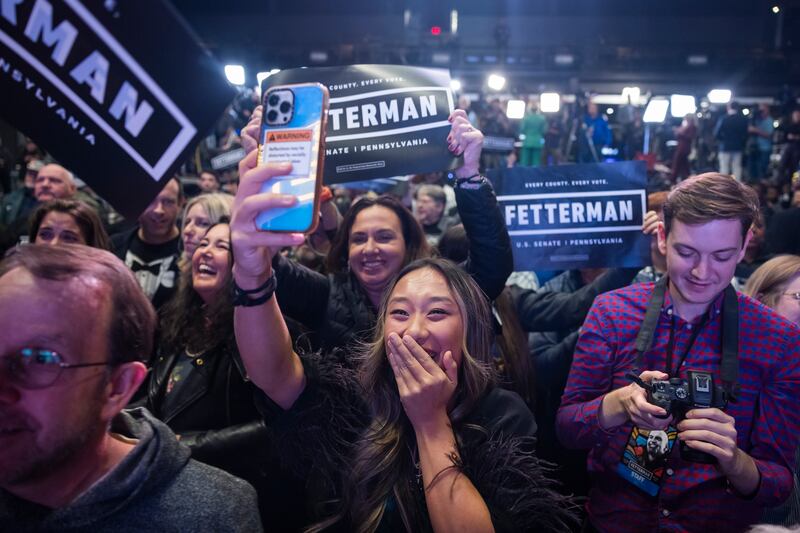 Supporters of Democratic Senate candidate for Pennsylvania John Fetterman cheer after he defeated the Republicans' Mehmet Oz. EPA