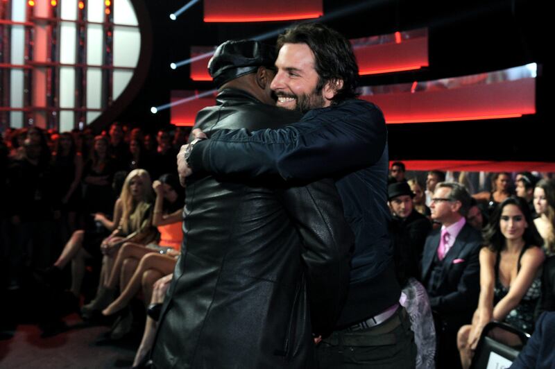 Actors Samuel L. Jackson and Bradley Cooper hug in the audience at the MTV Movie Awards in Sony Pictures Studio Lot in Culver City, Calif., on Sunday April 14, 2013. (Photo by Jordan Strauss/Invision for MTV/AP Images) *** Local Caption ***  2013 MTV Movie Awards - Audience & Backstage.JPEG-0bf61.jpg