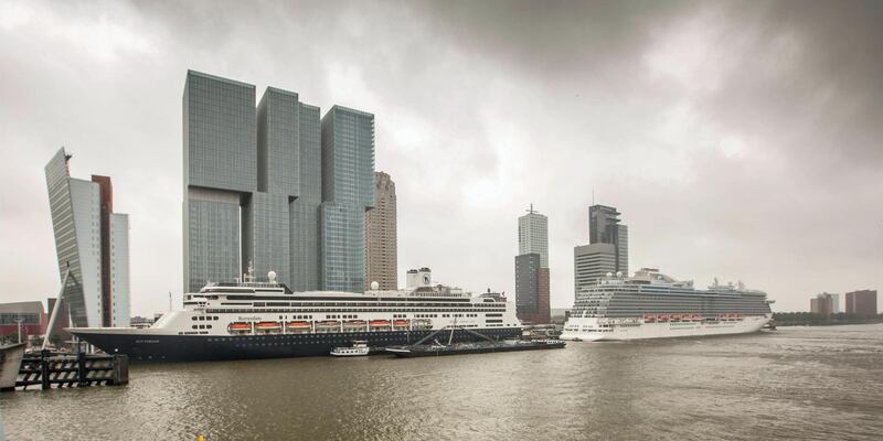 E5JFC0 Holland, Rotterdam, Kop van Zuid District, cruise terminal, highrise buildings. Cruise ship MS Rotterdam, Ocean Princess moored