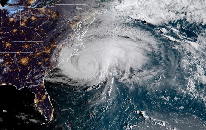 This satellite image provided by NOAA shows Hurricane Florence off the eastern coast of the United States on Thursday, Sept. 13, 2018. (NOAA via AP)