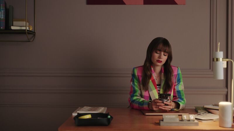 Lily Collins's character sports a fringe in season three of Netflix's Emily in Paris. Photo: Netflix