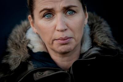 Denmark's Prime Minister Mette Frederiksen reacts as she meets journalists after visiting a closed and empty mink farm near Kolding, Denmark, on November 26, 2020. Prime Minister Frederiksen's government has acknowledged that its decision to cull more than 15 million minks had no legal basis for those not contaminated by the Covid-19 variant, infuriating breeders. A mutated version of the new coronavirus detected in Danish minks that raised concerns about the effectiveness of a future vaccine has likely been eradicated, Denmark's health ministry said on November 19, 2020. - Denmark OUT
 / AFP / Ritzau Scanpix / Ritzau Scanpix / Mads Nissen
