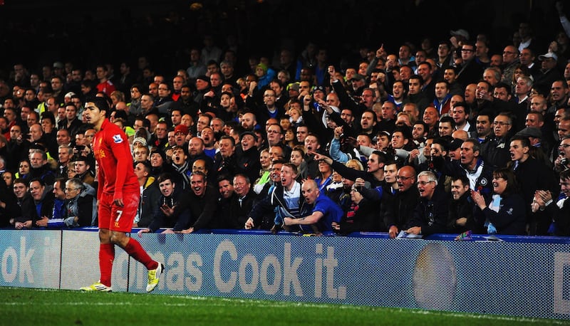 LONDON, ENGLAND - NOVEMBER 11:  Luis Suarez of Liverpool is seen in front of the Chelsea fans during the Barclays Premier League match between Chelsea and Liverpool at Stamford Bridge on November 11, 2012 in London, England.  (Photo by Mike Hewitt/Getty Images)