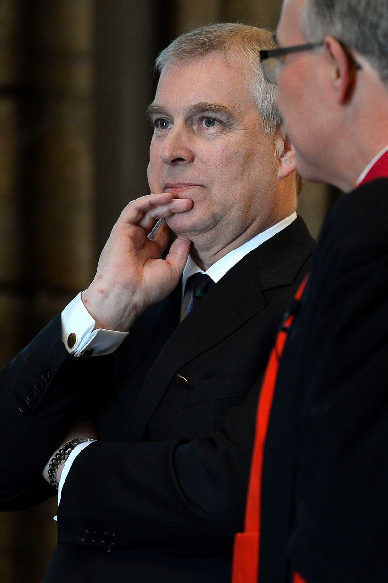 Prince Andrew, Duke of York, and Dean of Westminster John Hall (R) wait for a visit from Emirati President Sheikh Khalifa bin Zayed al-Nahayan (unseen) at Westminster Abbey in central London on May 1, 2013 on the second day of his state visit to Britain. The UAE president was to face questions from Prime Minister David Cameron during a meeting over allegations that three British men jailed in Dubai were tortured. AFP PHOTO / BEN STANSALL
 *** Local Caption ***  027931-01-08.jpg