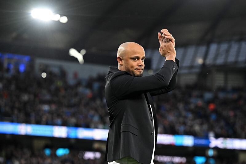 Burnley manager Vincent Kompany applauds supporters at the Etihad Stadium. AFP