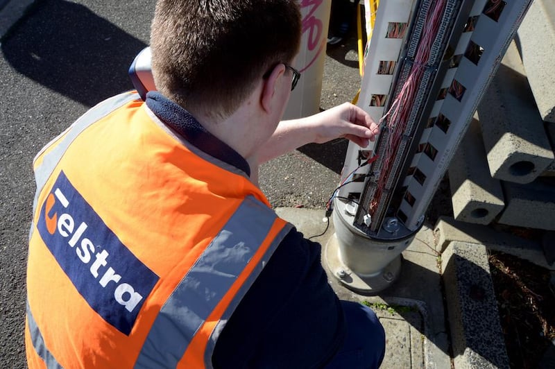 This year’s his year’s Broadband World Forum is hosted by Australian telecoms and media company Telstra. Above, a Telstra field technician conducts maintenance work in Melbourne, Australia. Carla Gottgens / Bloomberg News