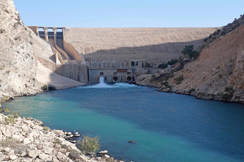 Iraqi officials warned of a drastic drop in the flow of water in a river from Iran due to low rainfall and dam-building in the Islamic Republic.