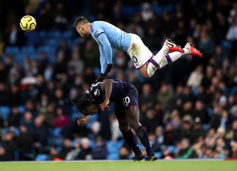 City's Nicolas Otamendi in action with West Ham's Michail Antonio. Reuters