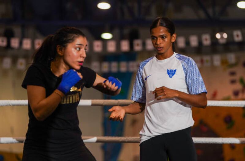 Ramla Ali (right) with Safa Gargouri at the Waad Academy, Jeddah, Saudi Arabia, during a community event with local women who like to Box. Picture date: Thursday August 18, 2022. (Photo by Nick Potts / PA Images via Getty Images)