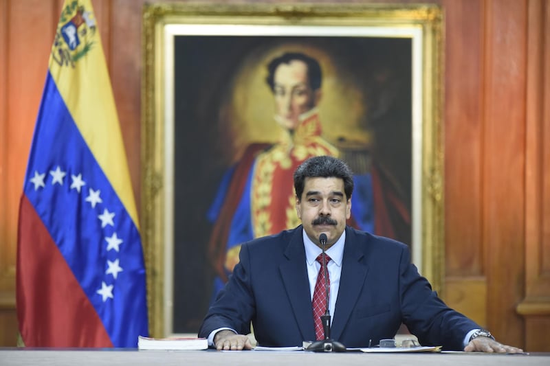 Nicolas Maduro, Venezuela's president, pauses while speaking during a televised press conference in Caracas, Venezuela, on Friday, Jan. 25, 2019. Maduro, speaking from the presidential palace in front of press, military and government officials, broadcast his comments across all radio and television airwaves and channels, showcasing his total control over the state apparatus despite Guaido's claims to legitimacy. Photographer: Carlos Becerra/Bloomberg