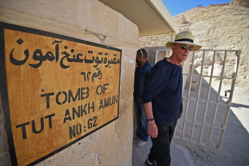 A man exits from the restored underground tomb. AFP