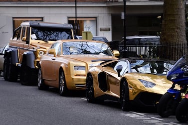 Three gold cars from Saudi Arabia (left-right) a 6x6 Mercedes G 63, Rolls-Royce Phantom Coupe and Lamborghini Aventador have received parking tickets on Cadogan Place in Knightsbridge, London.PA Photos