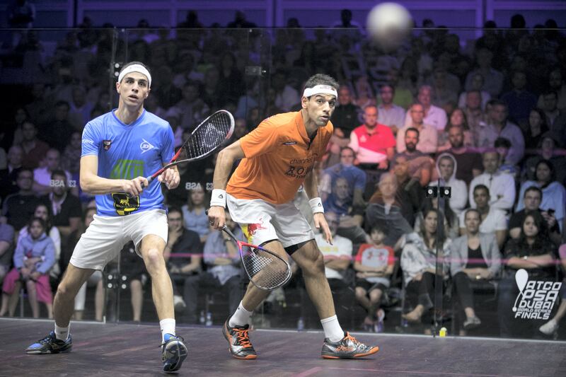 DUBAI, UNITED ARAB EMIRATES - JUNE 10, 2018. 

Egypt's Mohamed ElShorbagy, orange, has defended his crown after coming back from a game down to beat compatriot and World No.2 Ali Farag, blue, to complete a thrilling day of final action in Dubai.

The finals of the ATCO PSA Dubai World Series Finals today saw the world’s top four players in two all-Egyptian battles.

In the women's match, Egypt’s World No.1 Nour El Sherbini, has taken the honors in the women’s ATCO PSA Dubai World Series Finals after overcoming compatriot Raneem El Welily, by a 3-1 margin inside Emirates Golf Club.

(Photo by Reem Mohammed/The National)

Reporter: Amith Pasath
Section: SP
