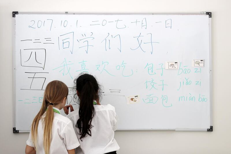 DUBAI , UNITED ARAB EMIRATES , OCT 1  ��� 2017 :-  Left to Right - Stephanie Finley and Prisha Gupta year 5 students learning Chinese language at the Hartland International School in Nad Al Sheba in Dubai.  ( Pawan Singh / The National ) Story by Roberta 