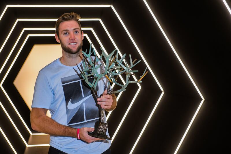 epa06310439 Jack Sock of USA poses with his trophy after winning the singles final match against Filip Krajinovic of Serbia at the Rolex Paris Masters tennis tournament in Paris, France, 05 November 2017.  EPA/CHRISTOPHE PETIT TESSON