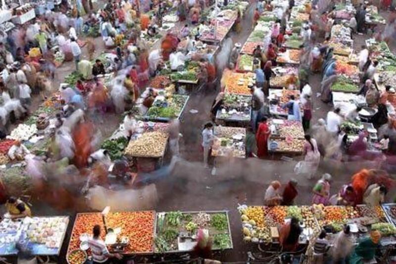 A vegetable market in Ahmedabad. The monsoons have not brought enough rain and food inflation could rise as a consequence. Ajit Solanki / AP Photo