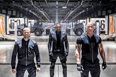 Jason Statham, Idris Elba, and Dwayne Johnson in 'Fast & Furious Presents: Hobbs & Shaw', which is due to be released in August 2019. Courtesy Universal Pictures