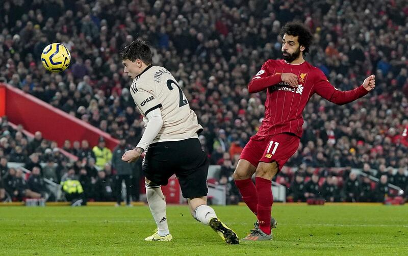 Mohamed Salah, right, takes a shot at goal. AP Photo