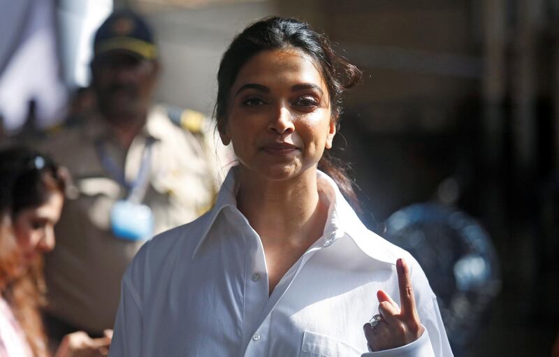 Bollywood actor Deepika Padukone shows an ink mark on her finger after casting her vote at a polling station in Mumbai, India April 29, 2019. Reuters