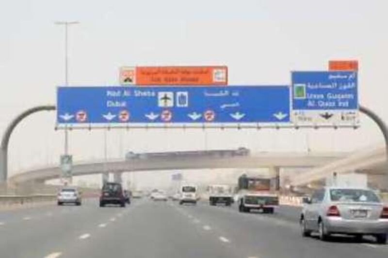 DUBAI, UNITED ARAB EMIRATES - July 31:  Salik road toll sign as seen on Sheikh Zayed Road in Dubai on July 31, 2008.  (Randi Sokoloff / The National) *** Local Caption ***  RS002-SALIK.jpgRS002-SALIK.jpg