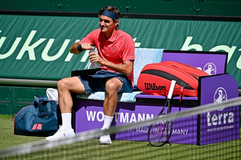 Roger Federer takes a drink prior to his match against Ilya Ivashka in the Halle Open first round match. Getty Images