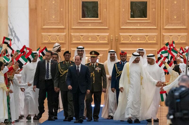 Egypt's President Abdel Fattah El Sisi is welcomed to Qasr Al Watan before his meeting with Sheikh Mohamed bin Zayed, Crown Prince of Abu Dhabi and Deputy Supreme Commander of the UAE Armed Forces. Courtesy Sheikh Mohamed bin Zayed Twitter