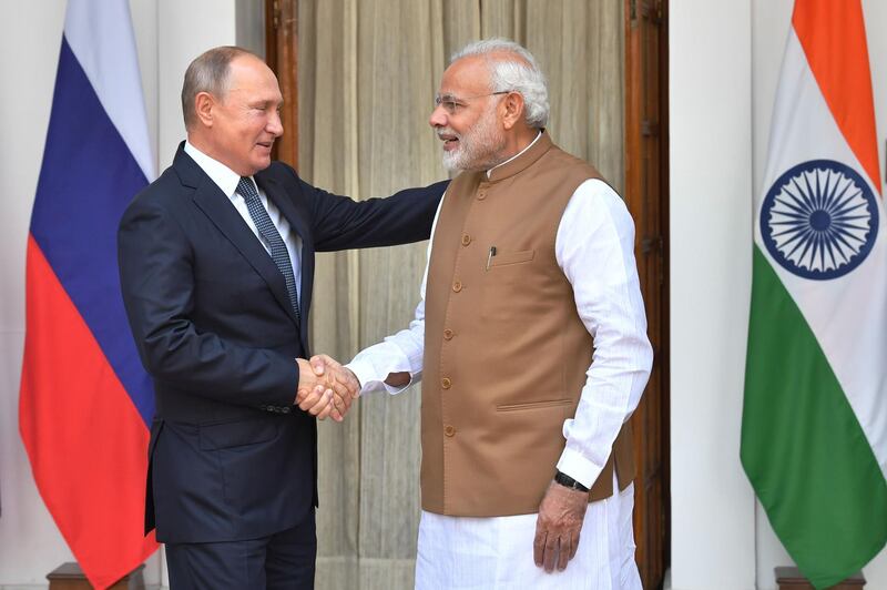 Indian Prime Minister Narendra Modi welcomes Russian President Vladimir Putin at Hyderabad House in New Delhi. AFP