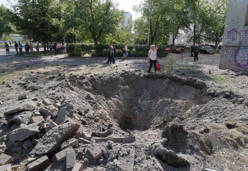 Damage near a residential building after a missile strike in Kyiv amid the Russian invasion. EPA 