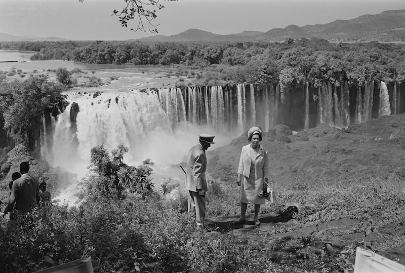 Queen Elizabeth at the Tissisal Falls with Emperor Haile Selassie during a visit to Ethiopia in 1965. Getty