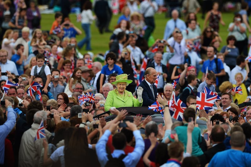 Queen Elizabeth and Prince Philip attend a diamond jubilee event at Stormont in Belfast, Northern Ireland.