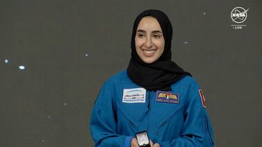 Nora Al Matrooshi holds her silver pin, which is awarded to astronauts who have completed training but have yet to fly to space. Photo: Nasa TV