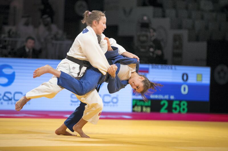 ABU DHABI, UNITED ARAB EMIRATES - OCT 26:Irinia Dolgova, white, Russia, wins the gold medal at Abu Dhabi Grand Slam 2017, playing against Milica Nikolic, blue, Serbia.Abu Dhabi Grand Slam 2017 is held at IPEC Arena in Zayed Sports City.(Photo by Reem Mohammed/The National)Reporter: AMITHSection: SP