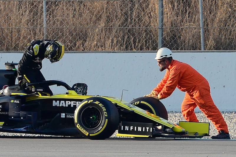 Renault's German driver Nico Hulkenberg gets out of his car during the tests for the new Formula One Grand Prix season at the Circuit de Catalunya in Montmelo, in the outskirts of Barcelona, on February 21, 2019. / AFP / Josep LAGO
