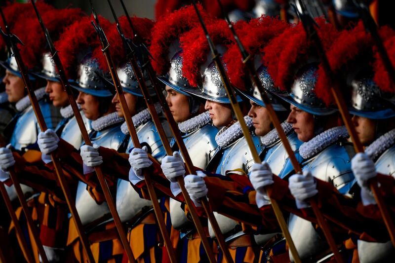 Swiss Guards attend the annual new papal swearing-in ceremony in the Vatican. AFP