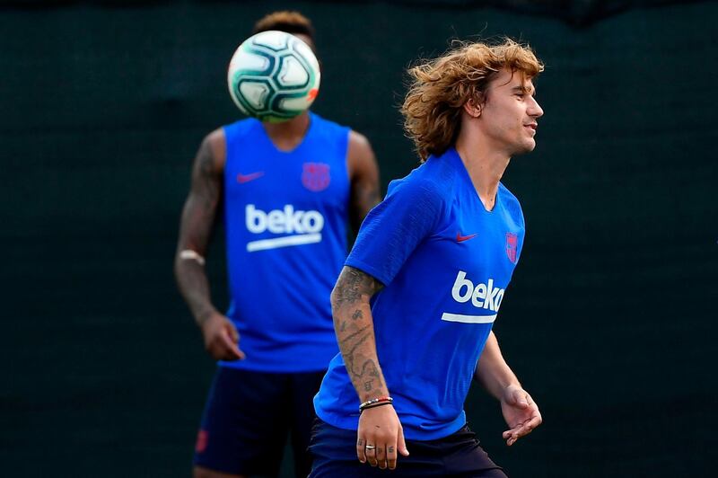 Barcelona's French forward Antoine Griezmann takes part in pre-season training at the Joan Gamper training ground in Sant Joan Despi near Barcelona. AFP