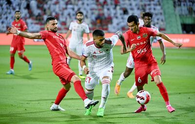 Shabab Al Ahli, in red, kicked off their season with a defeat at home to Sharjah. Photo: AGL