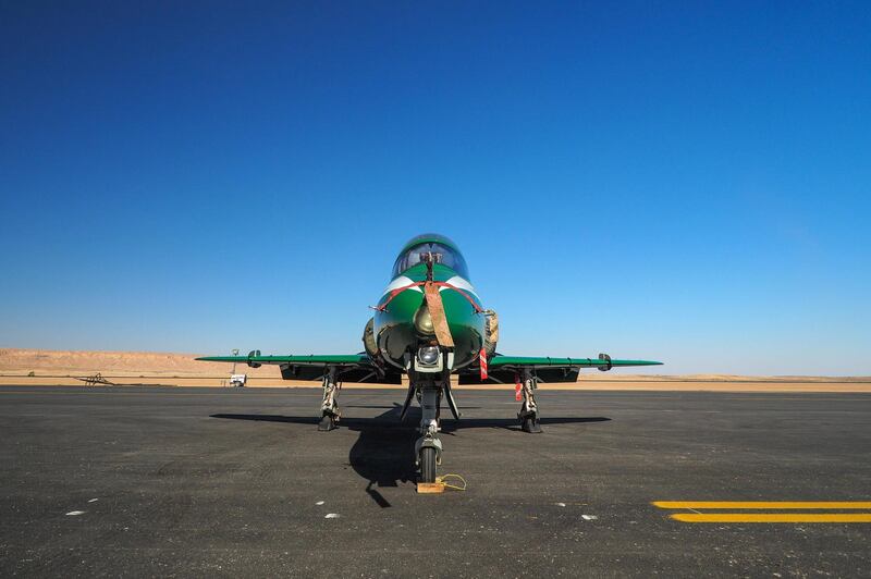 An aircraft of the Saudi Hawks Royal Saudi Air Force display team sits on the runway at Saudi Air Show at Al Thumamah airport in Riyadh. Bloomberg