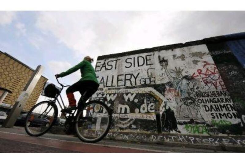 The Berlin Wall's East Side Gallery is decorated with graffiti art by international artists.
